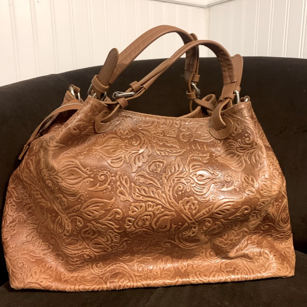 Large Leather Tote with intricate design in like new condition